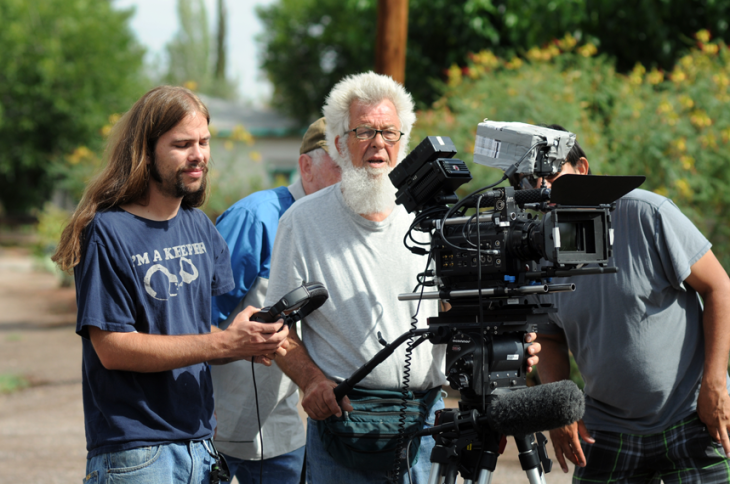 Sound Recordist Zachary Hale, a student at NMSU’s Creative Media Institute, confers with Director of Photography Dale Sonnenberg.