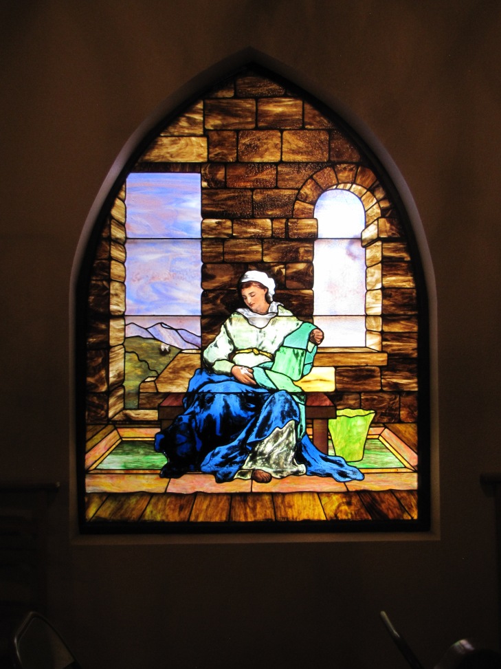 One of several beautifully crafted stained glass windows that grace the inside of the property's private chapel.