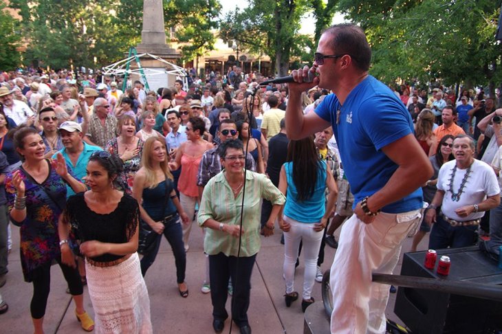 Lead singer Felipe Ruibal keeps the crowd on its feet and dancing.